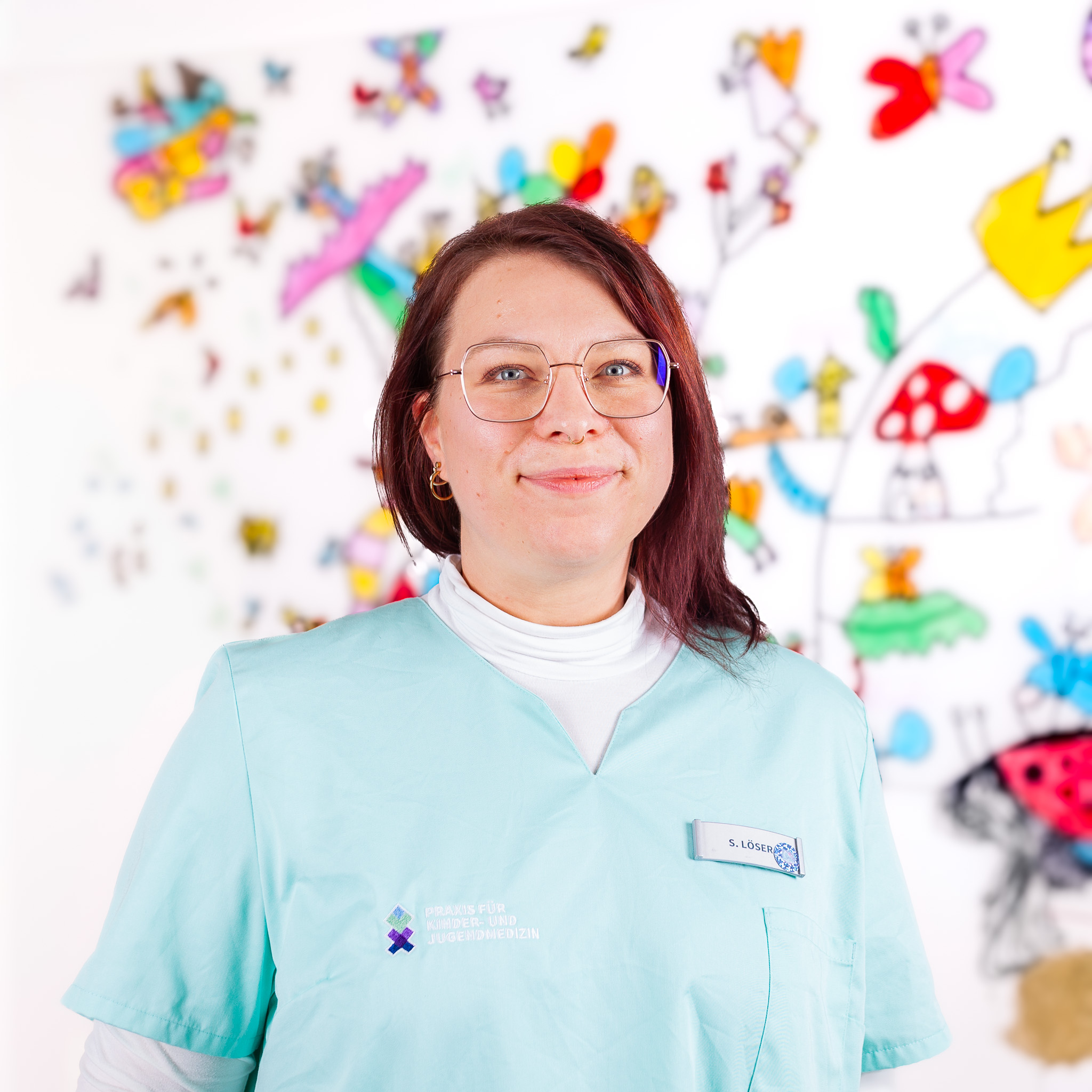 Zufriedene Mitarbeiterin: Frau Löser. Medizinische Fachangestellte in der Praxis Kinder- und Jugendmedizin in Heddesheim